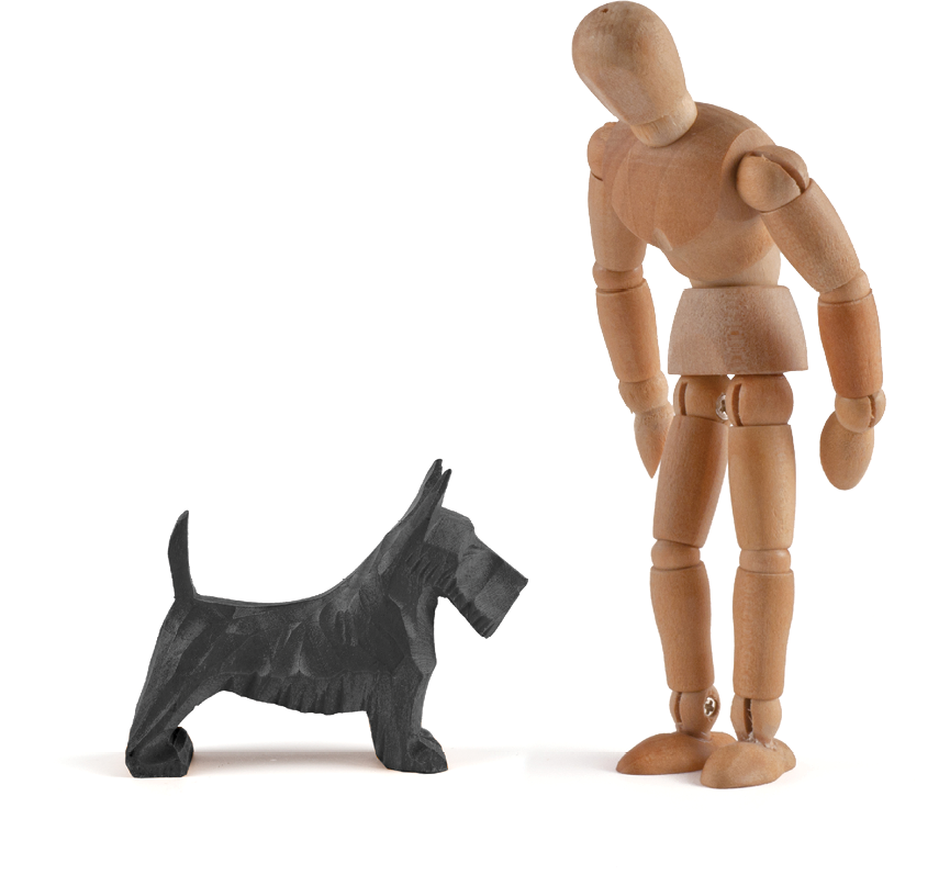 Wooden mannequin and dog