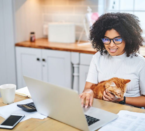 Pet owner researching pet insurance options