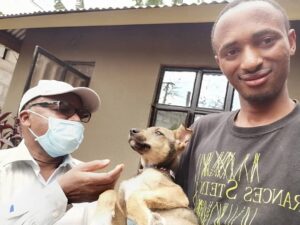 Urban Tails founder Ismael Mungaya with local veterinarian, Lawrence Mchaki